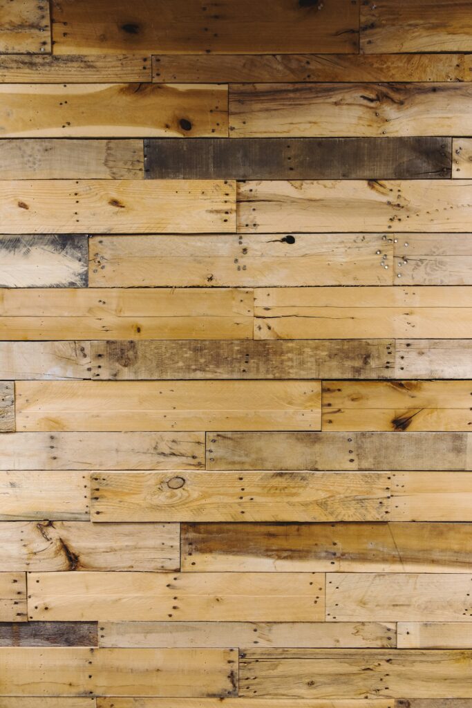 an aged wall of nailed wood to illustrate a history of corvallis wood tour - one of many things to do in corvallis oregon!